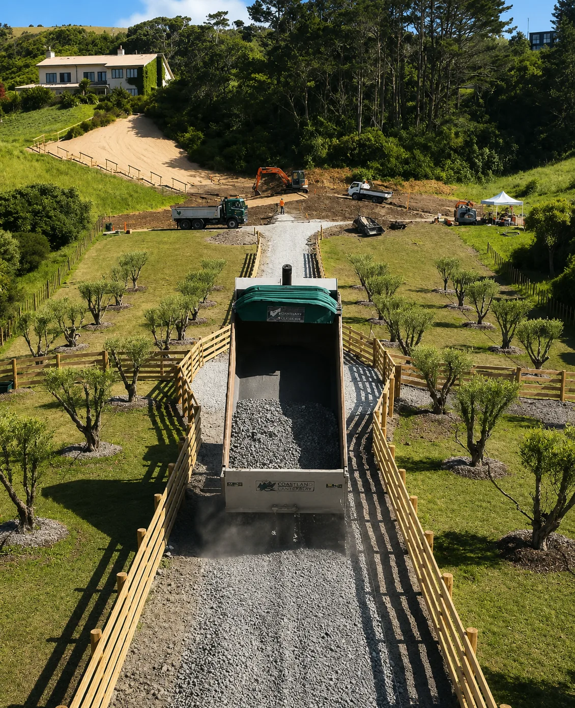 Aerial view of Muriwai Estate driveway construction and orchard layout