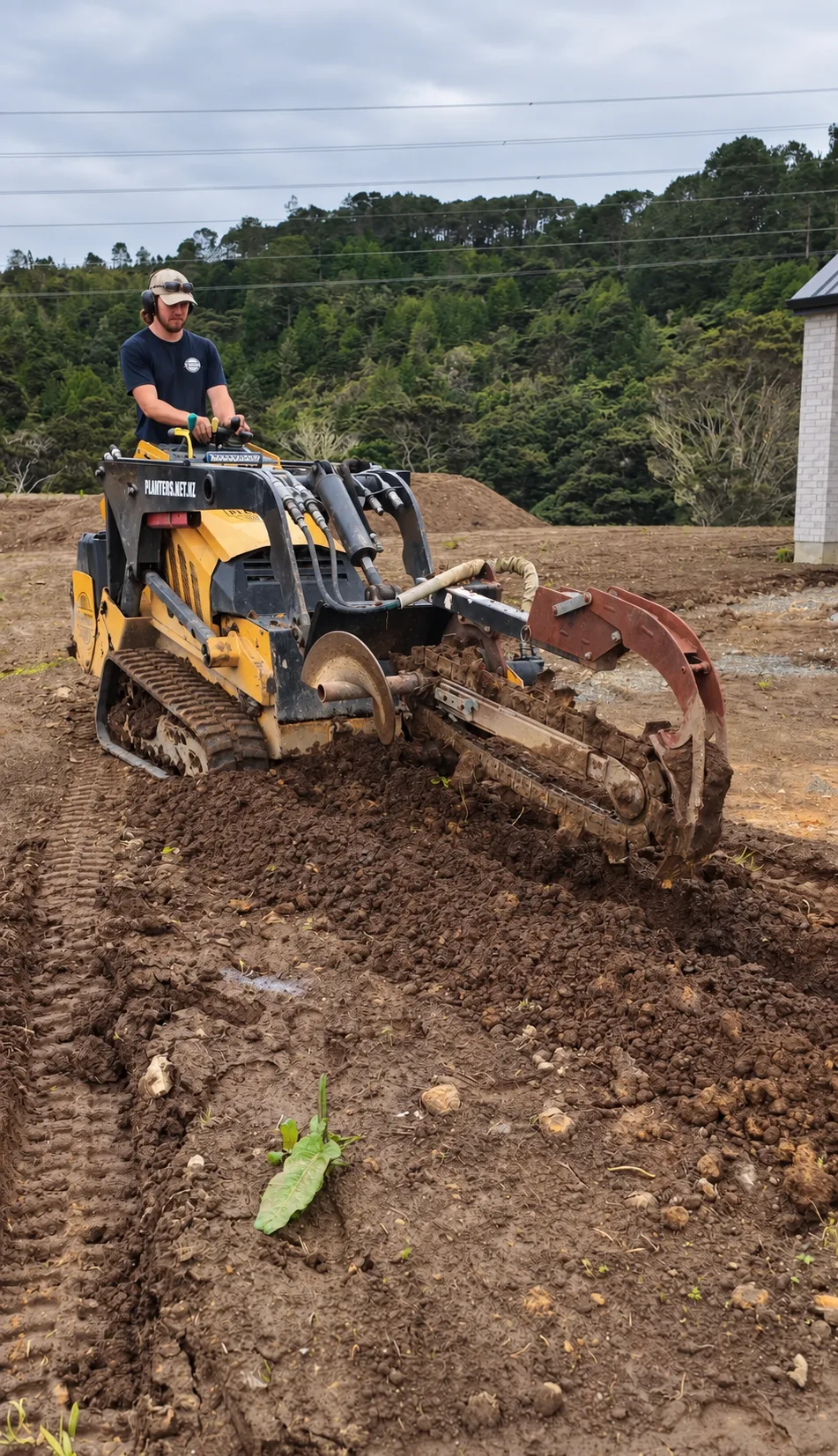 Planters operator trenching during site preparation at the Coatesville Riverhead Highway construction site