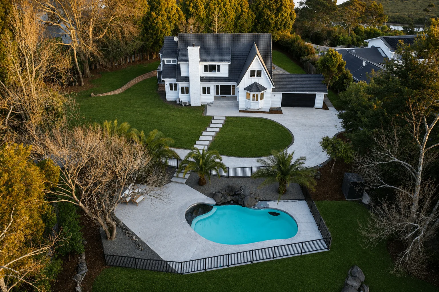 Dove Manor aerial view of pool and estate landscape